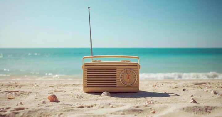 A vintage radio on an ocean shore.